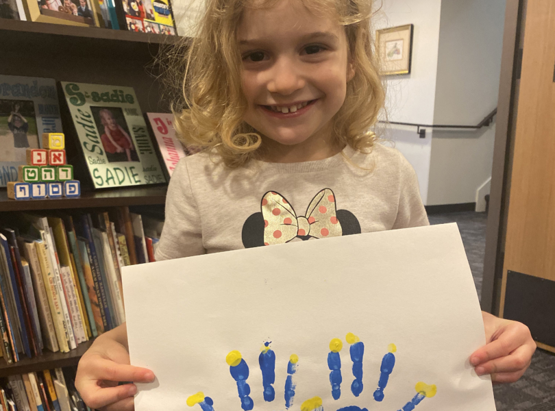 Girl holding picture